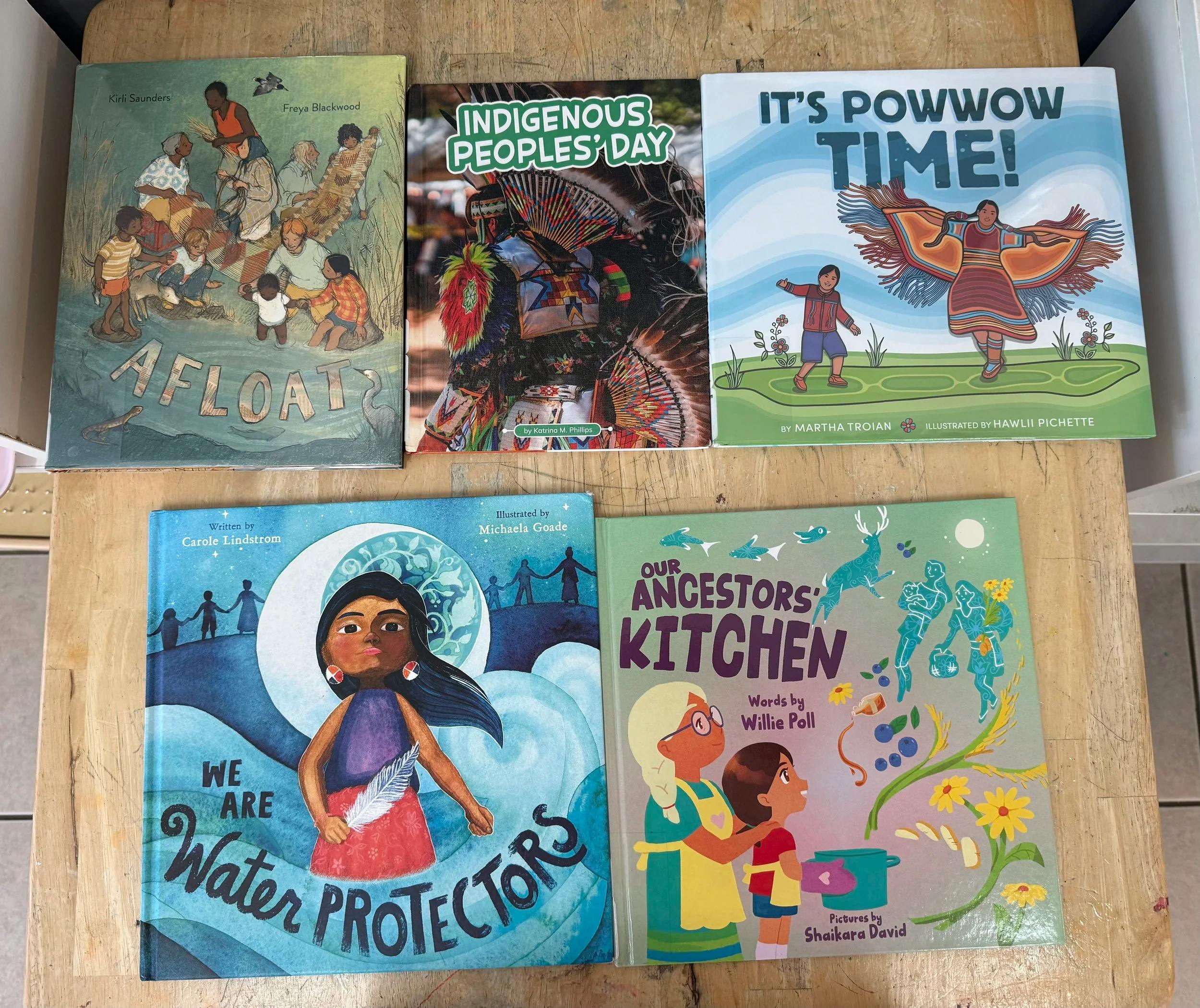Five children's books with Indigenous themes, including 'Afloat' and 'It's Powwow Time!'