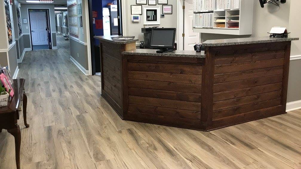 Reception desk in an office hallway