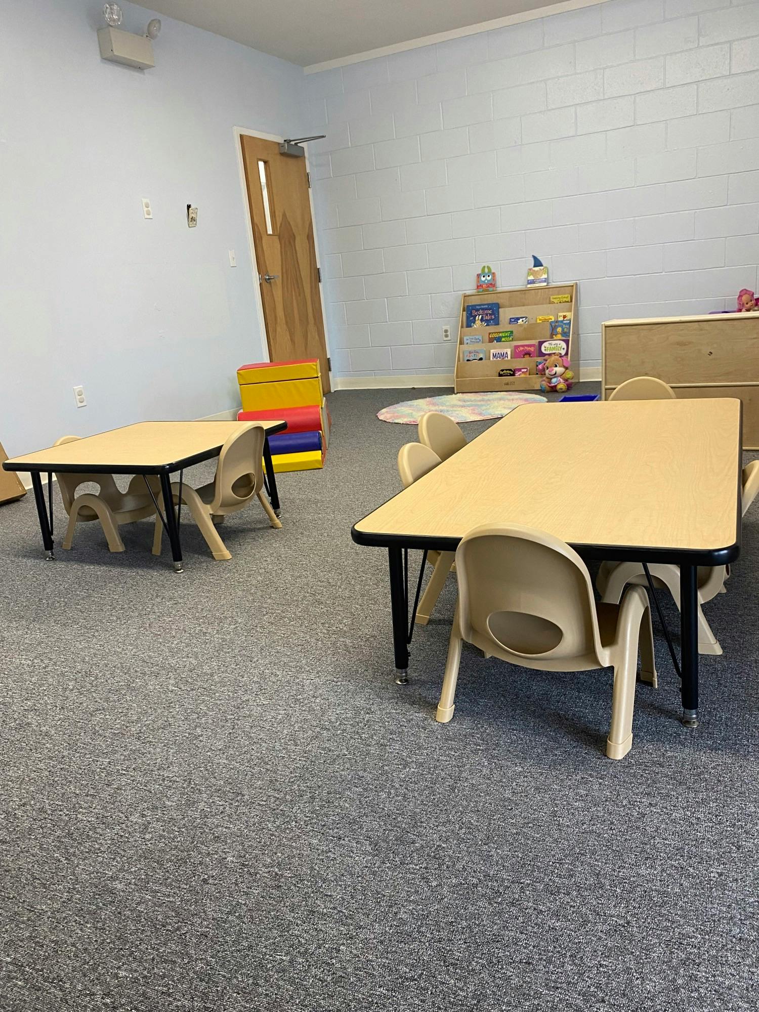 Classroom with small tables and chairs