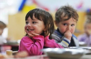 Two children sitting at a table