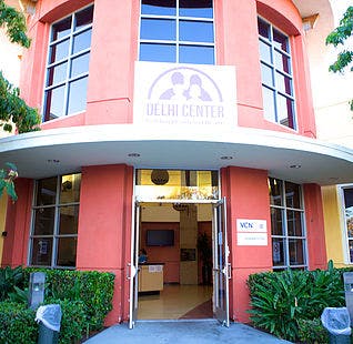 Building entrance with sign above reading "Health Center"
