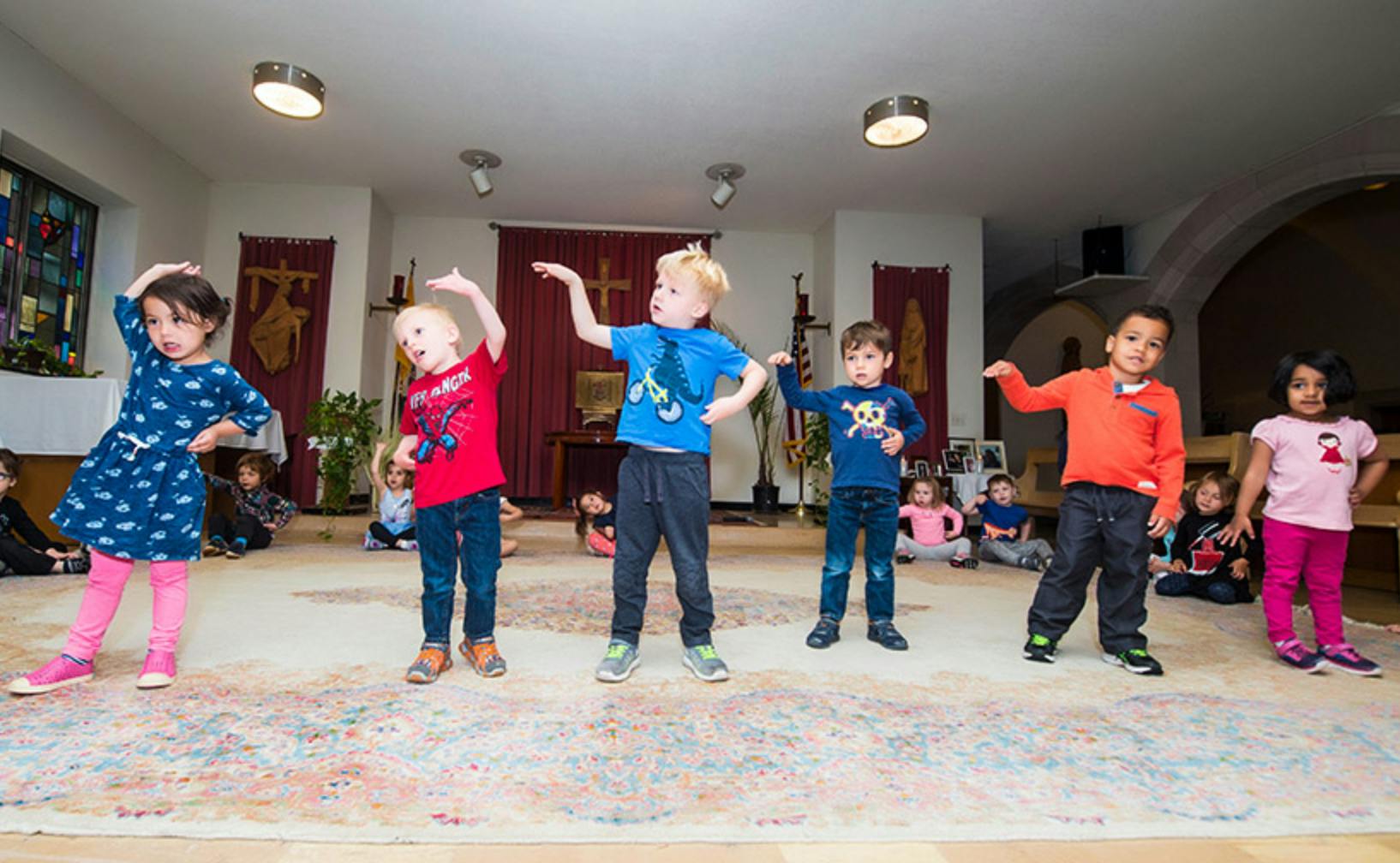 Children dancing in a room