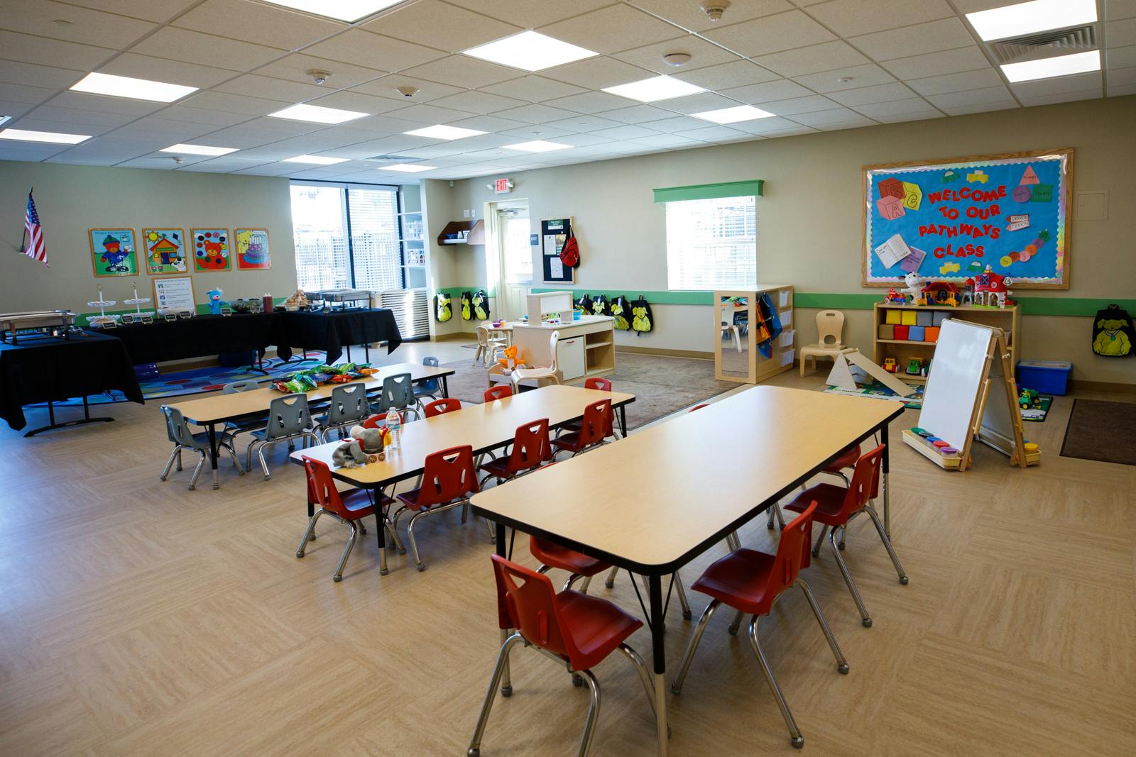 Empty classroom with tables and chairs