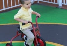 Child riding a tricycle