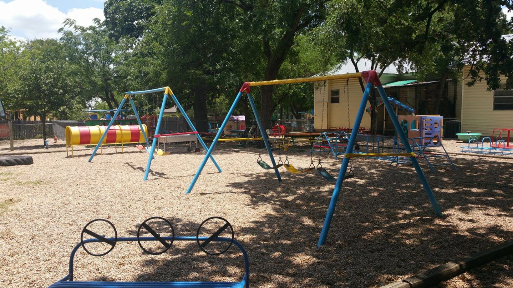 Playground with swings and a tunnel