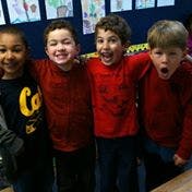 Four children standing together