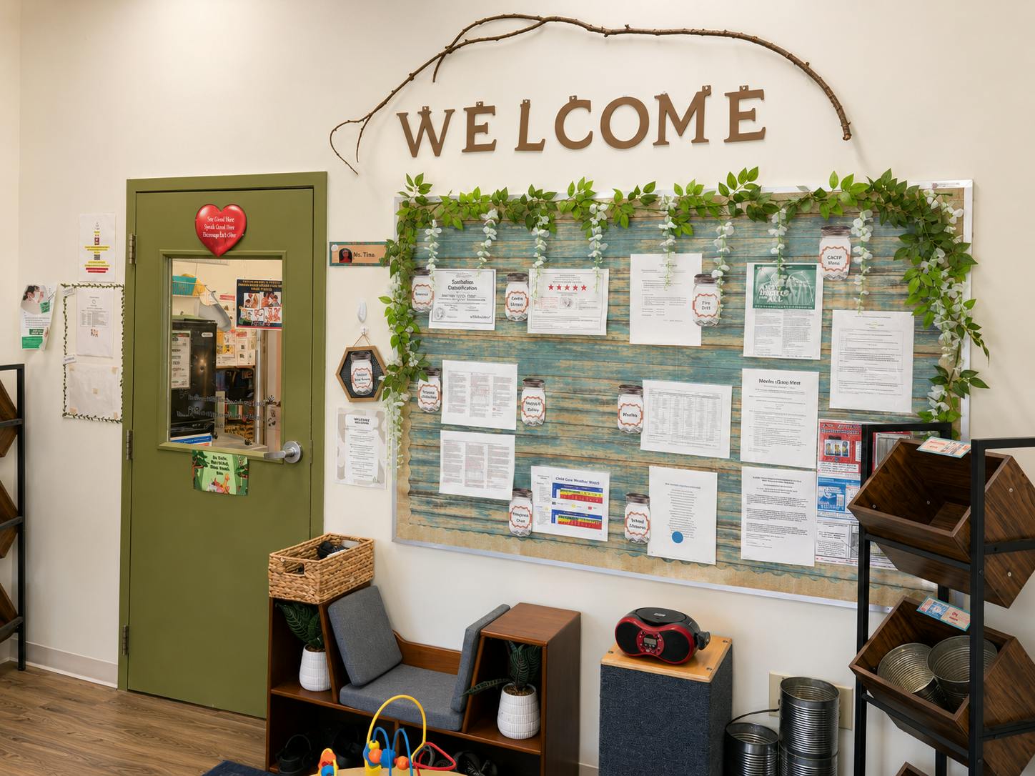 A decorated welcome sign above a bulletin board with various informational papers