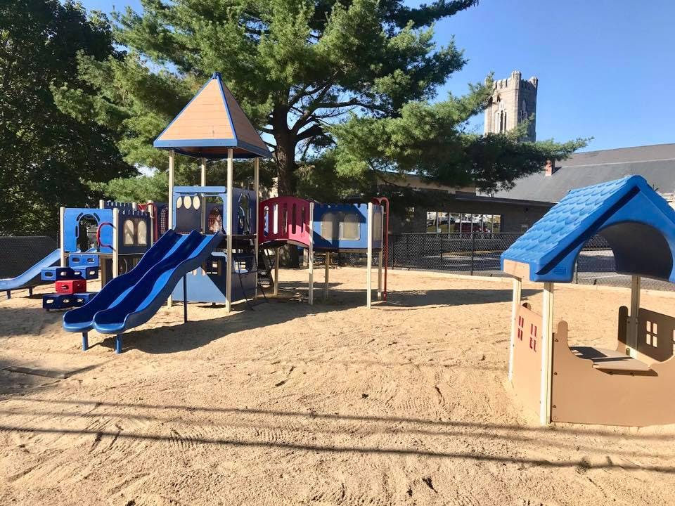 Playground with slides and play structures on sand