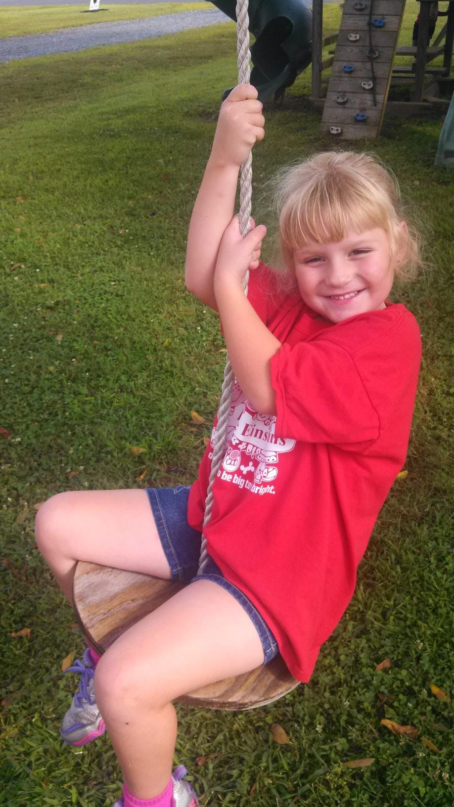 Child on a rope swing