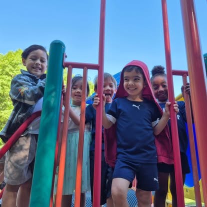 Children on a playground structure