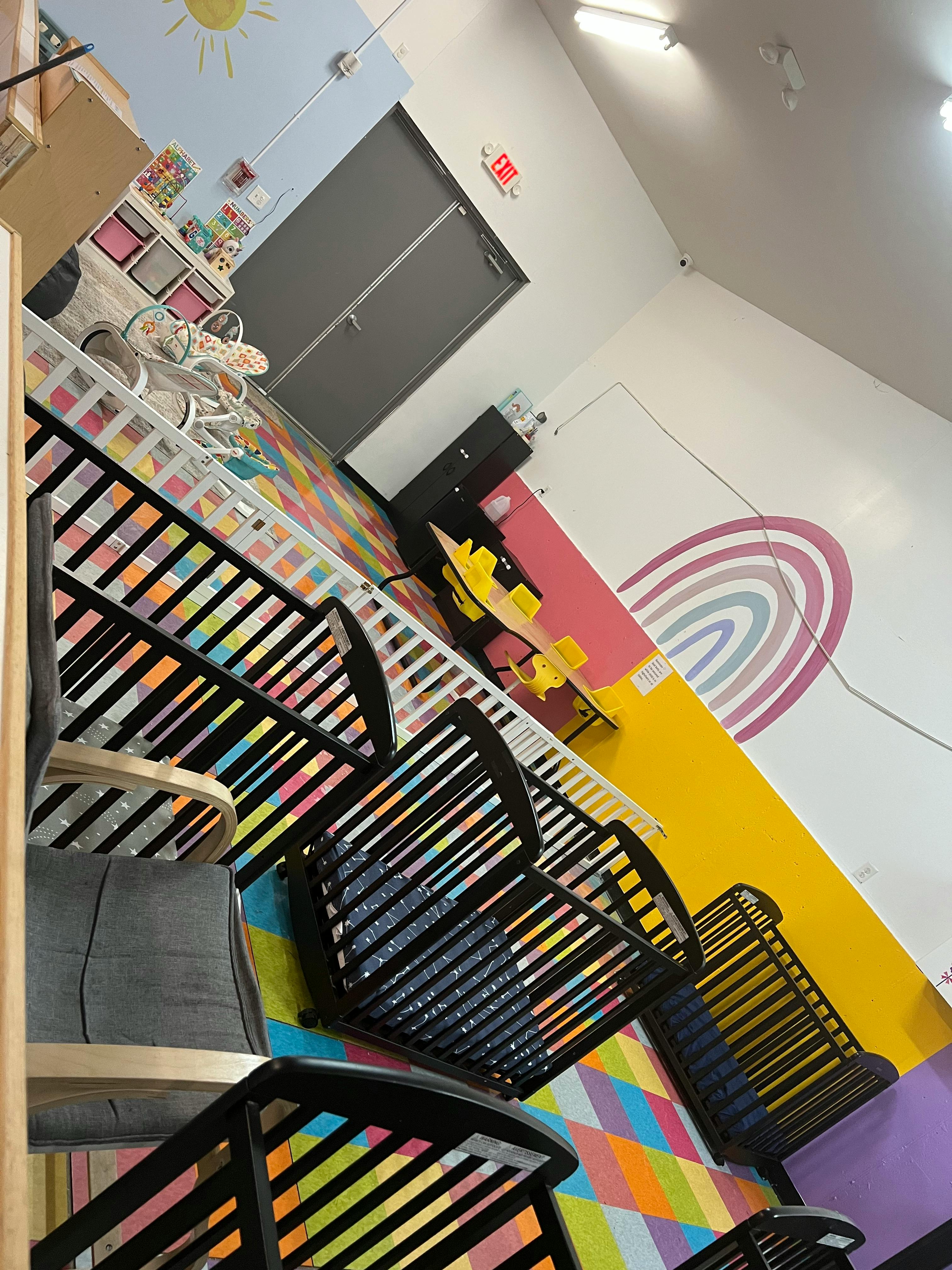 Colorful classroom with small chairs and tables
