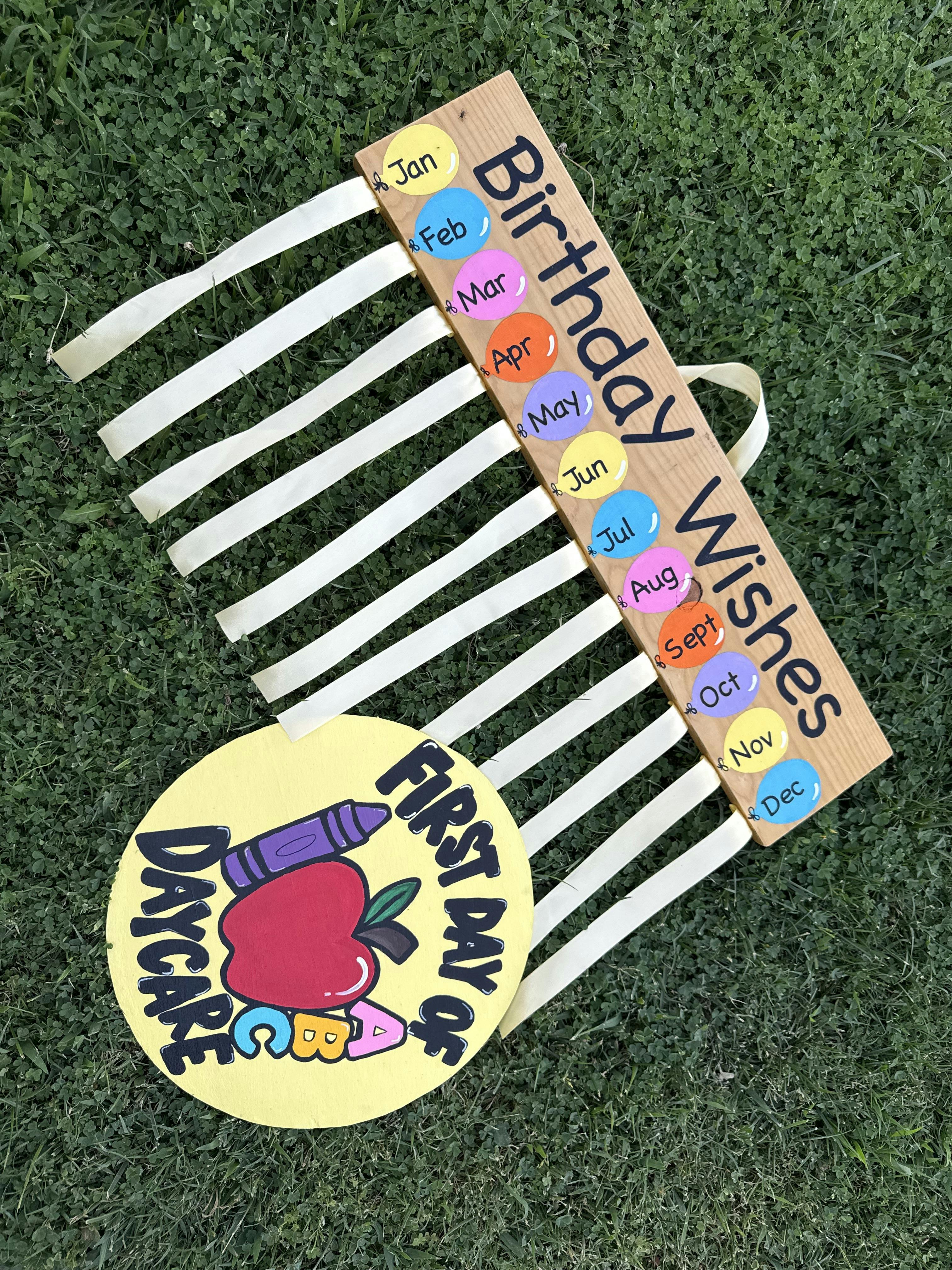 Birthday wishes wall hanging with months of the year and a daycare sign
