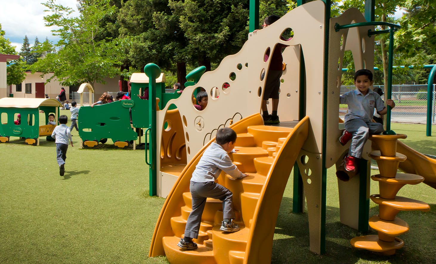 Children playing on playground equipment