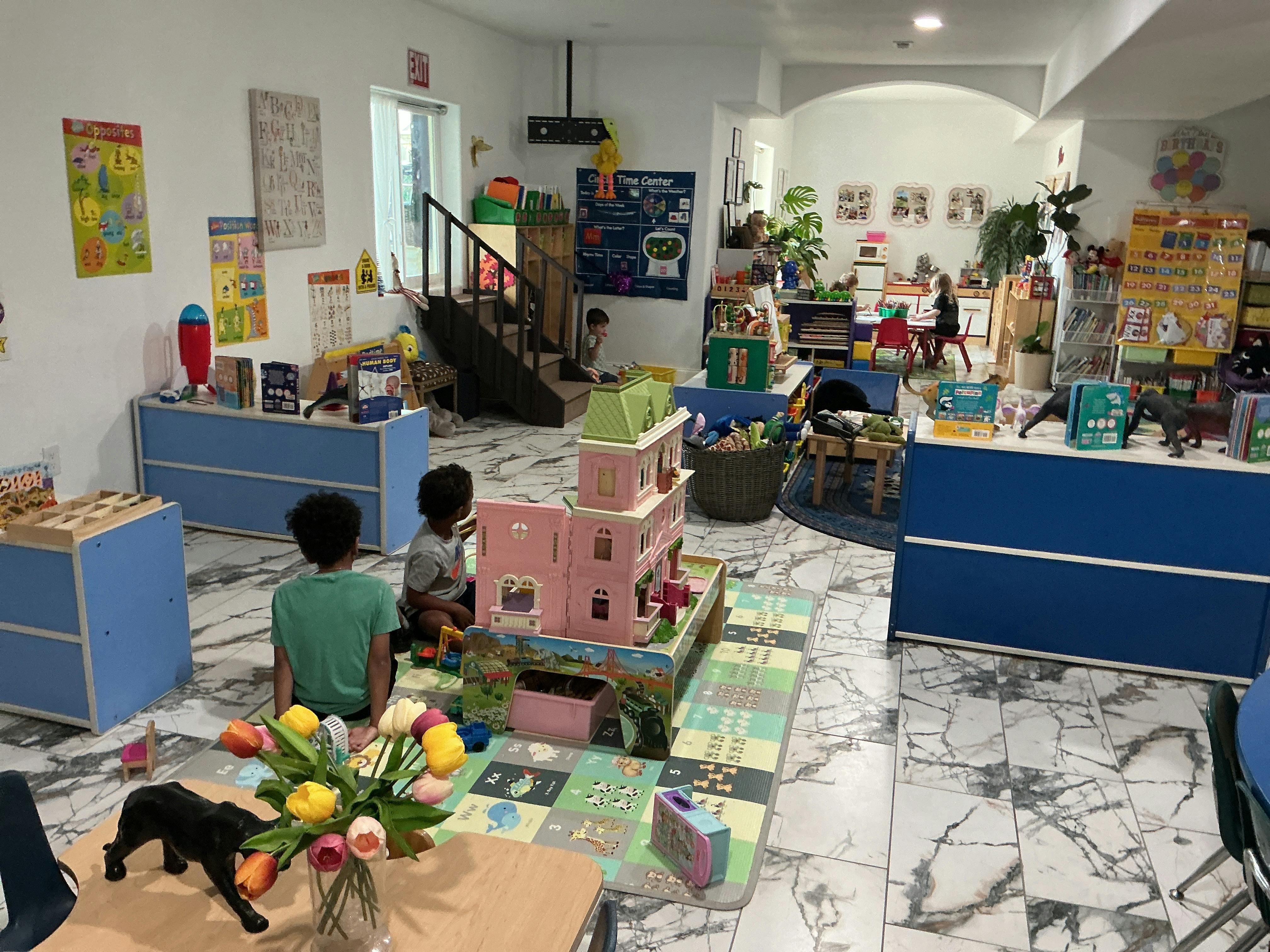 Children playing with toys in a classroom