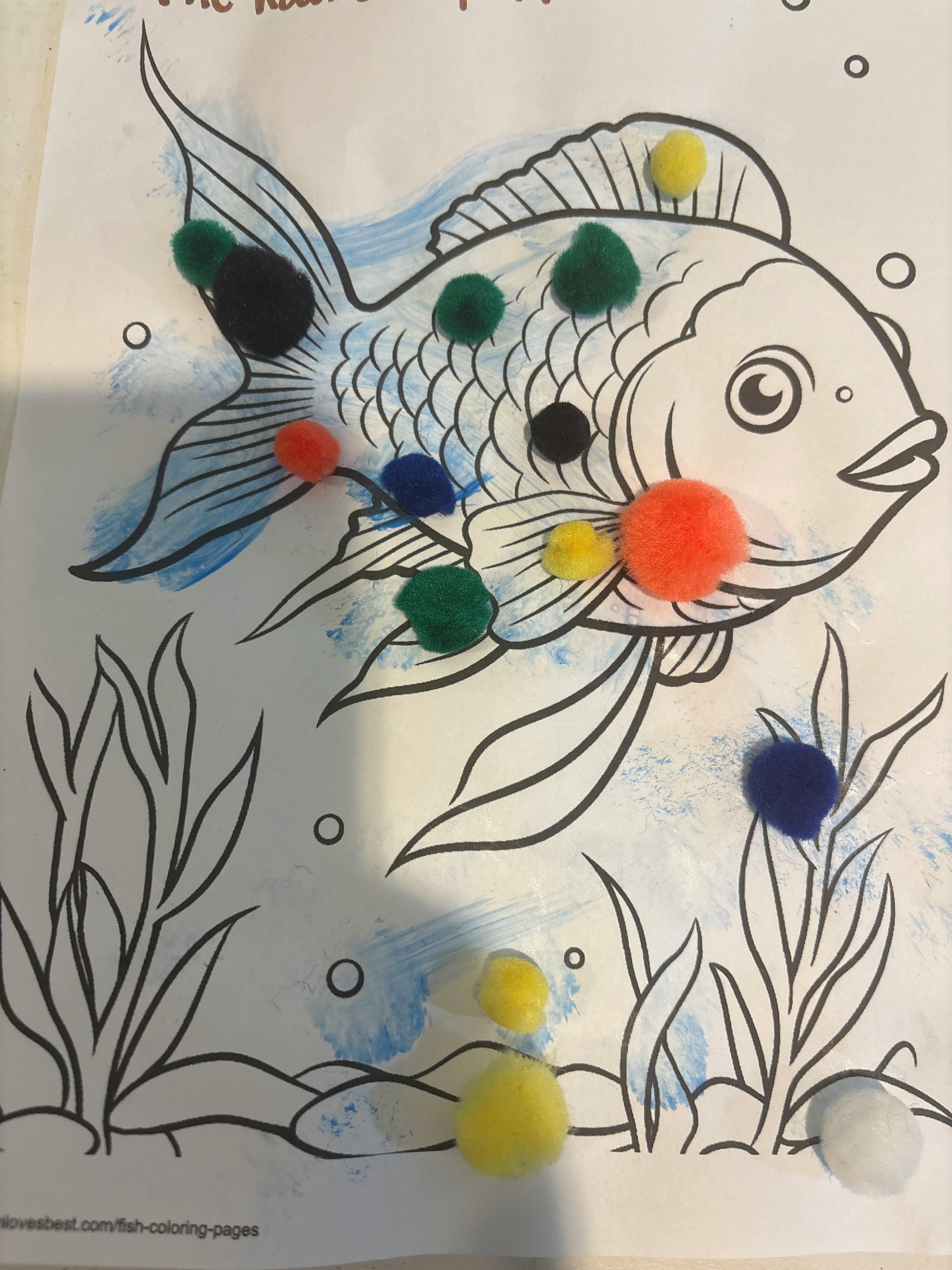Fish coloring page with colorful pom-poms