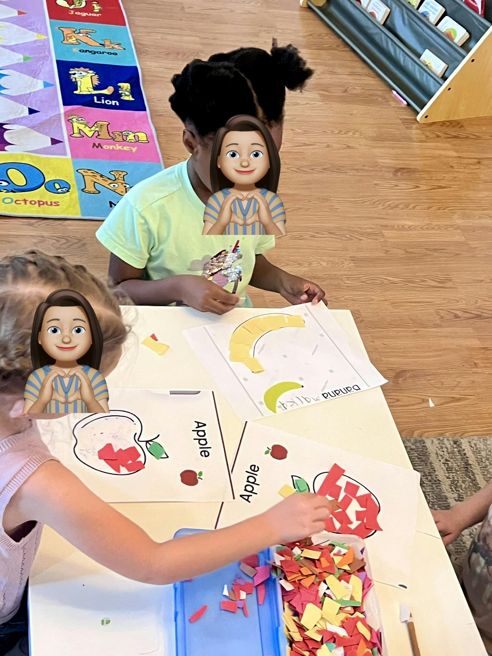 Children working on craft activities at a table