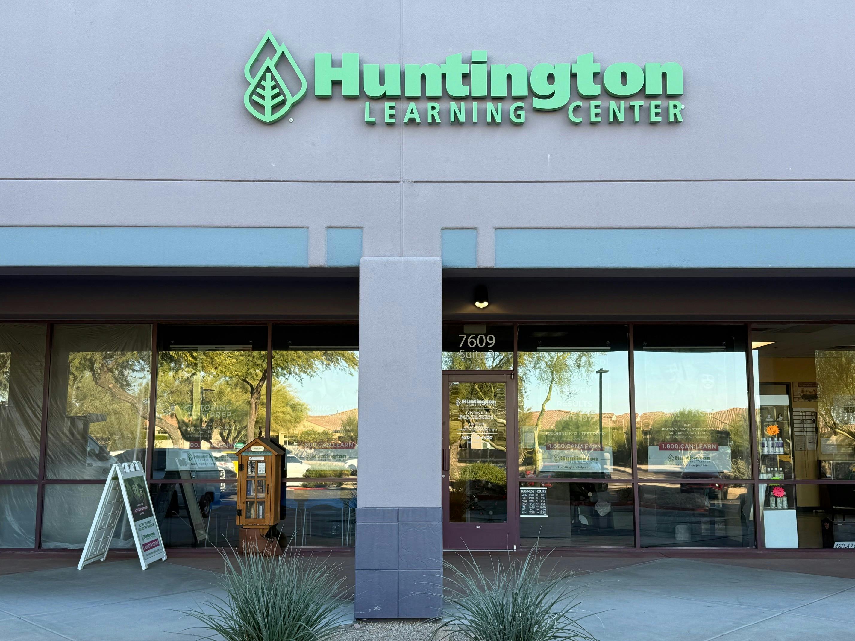 exterior of a Huntington Learning Center building with green sign