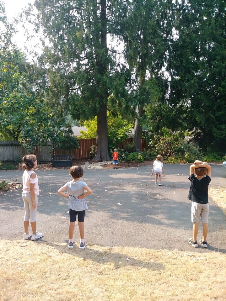 Four children playing outdoors