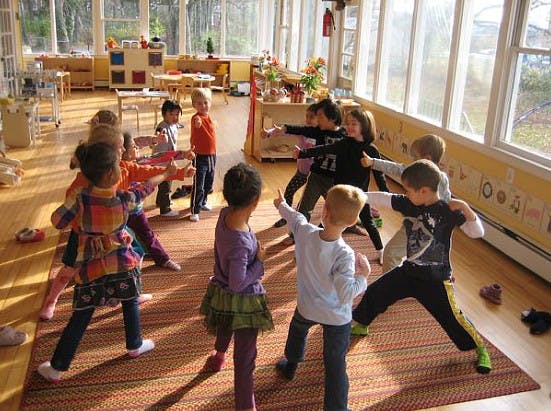 Children playing in a classroom