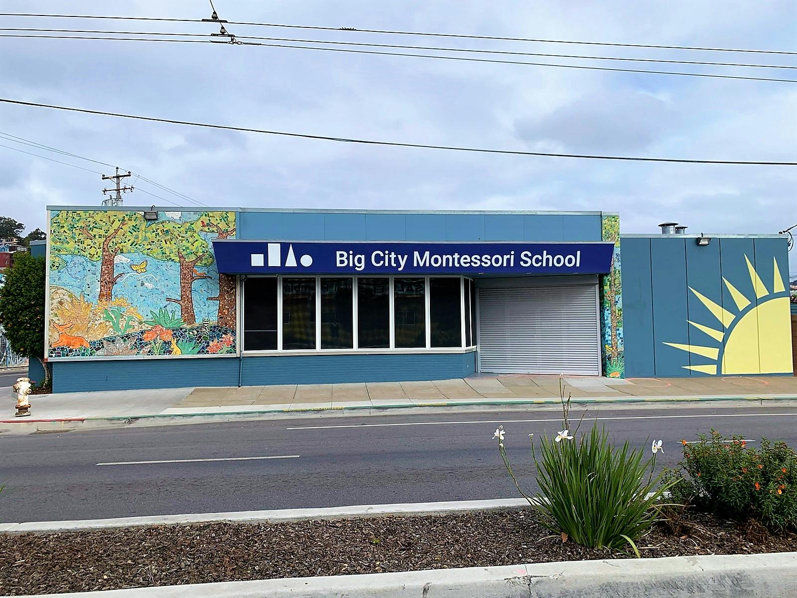 Big City Montessori School building with murals