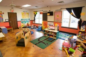 Playroom with toys and small furniture