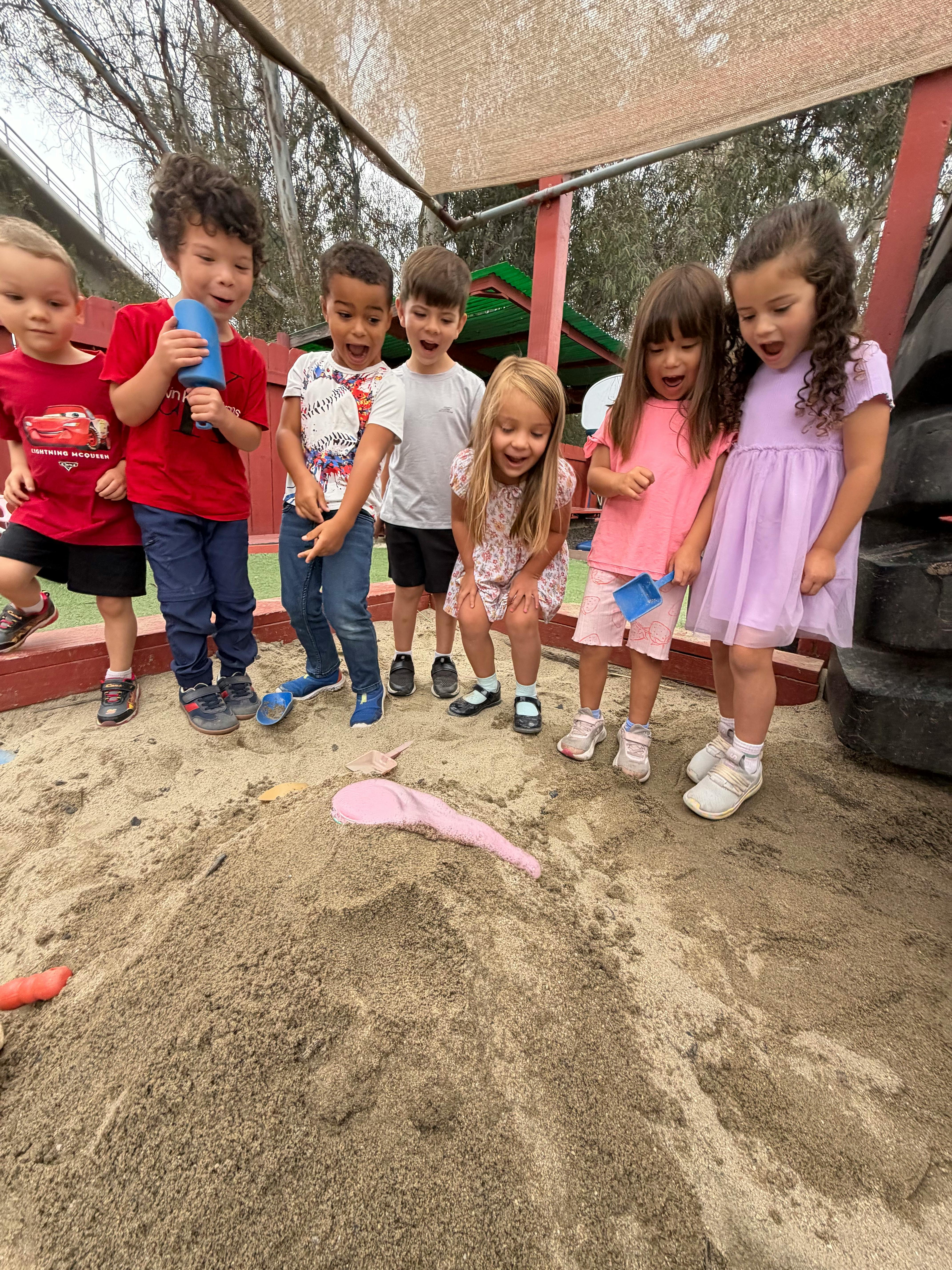 Group of children playing in a sandbox