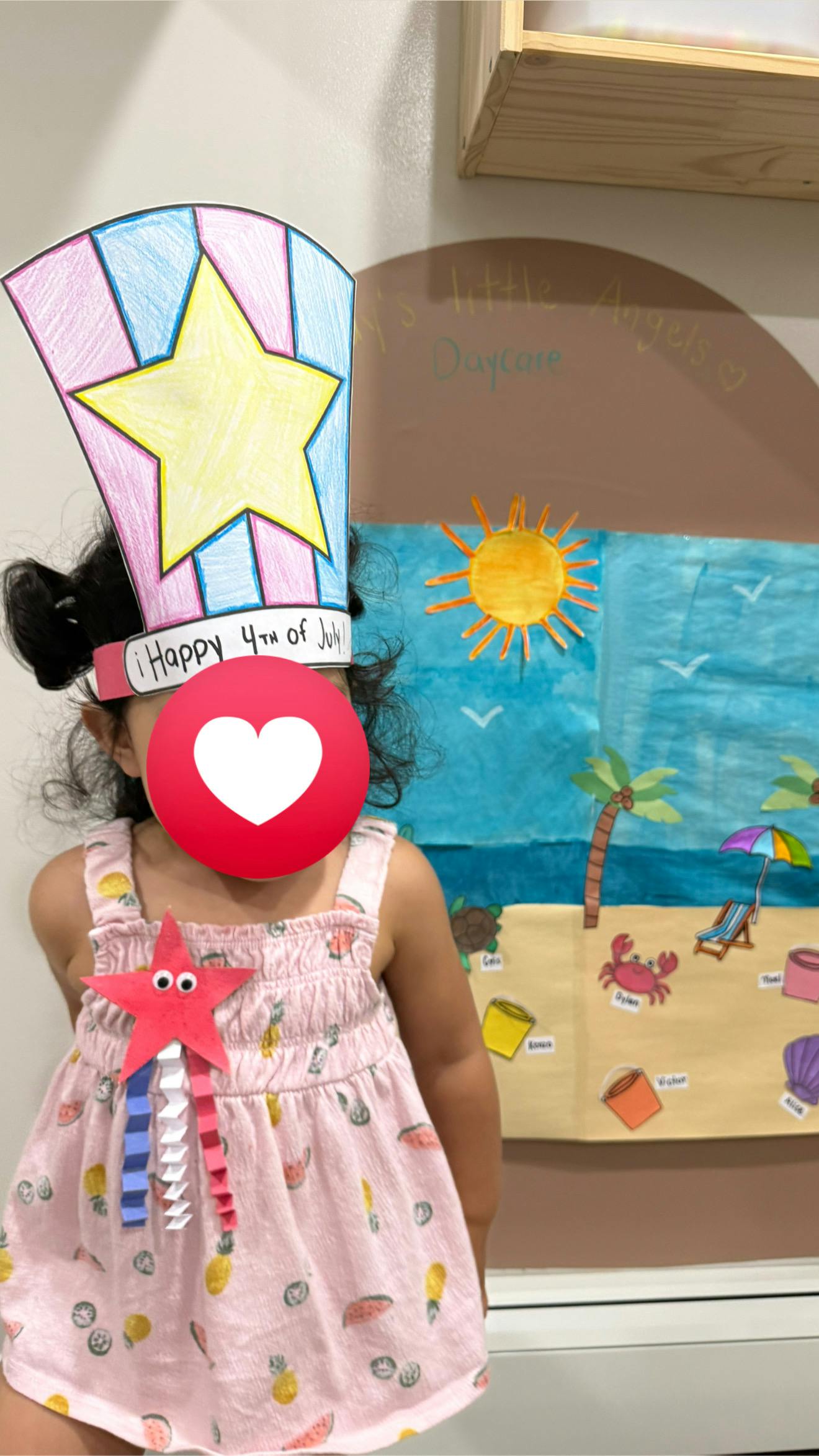 Child wearing a Happy 4th of July paper crown