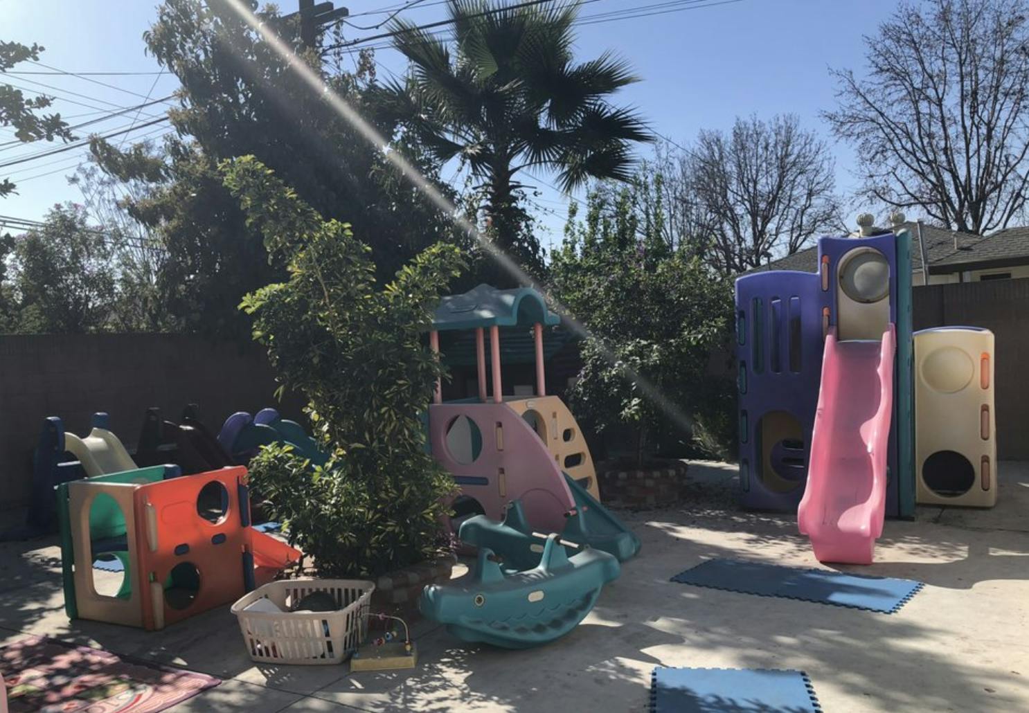 Outdoor playground with multiple slides and play structures