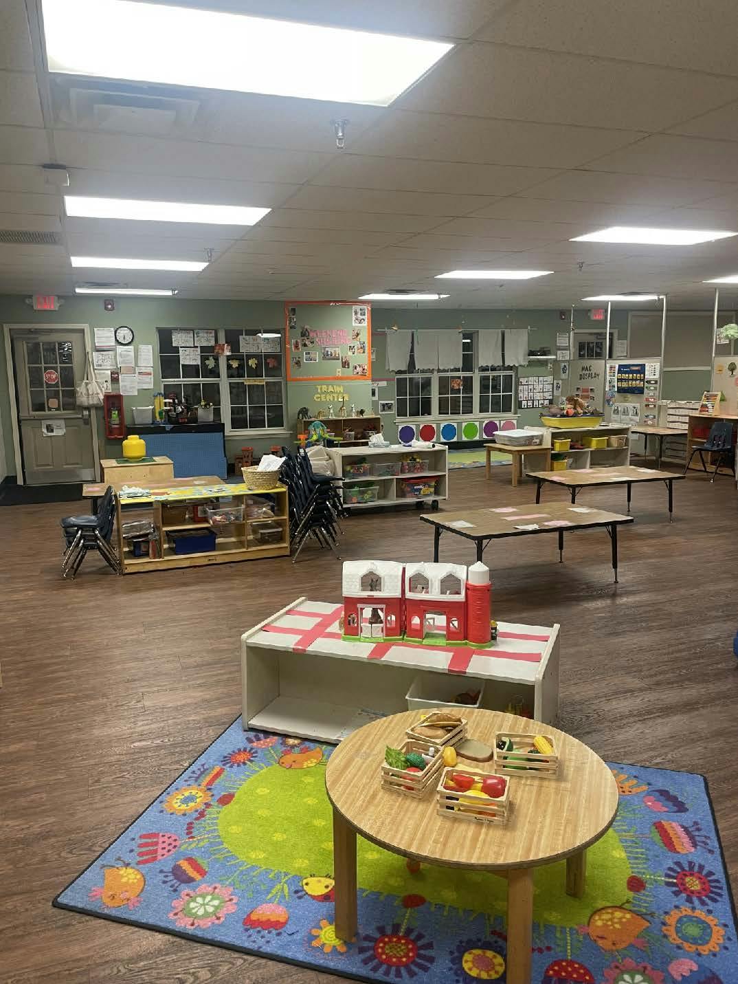 Classroom with children's furniture, toys, and learning materials