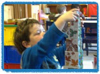 Child stacking blocks