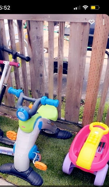 Children's toys including a scooter, ride-on toy, and wagon
