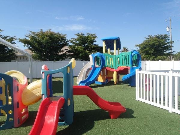 Colorful playground equipment with slides and climbing structures