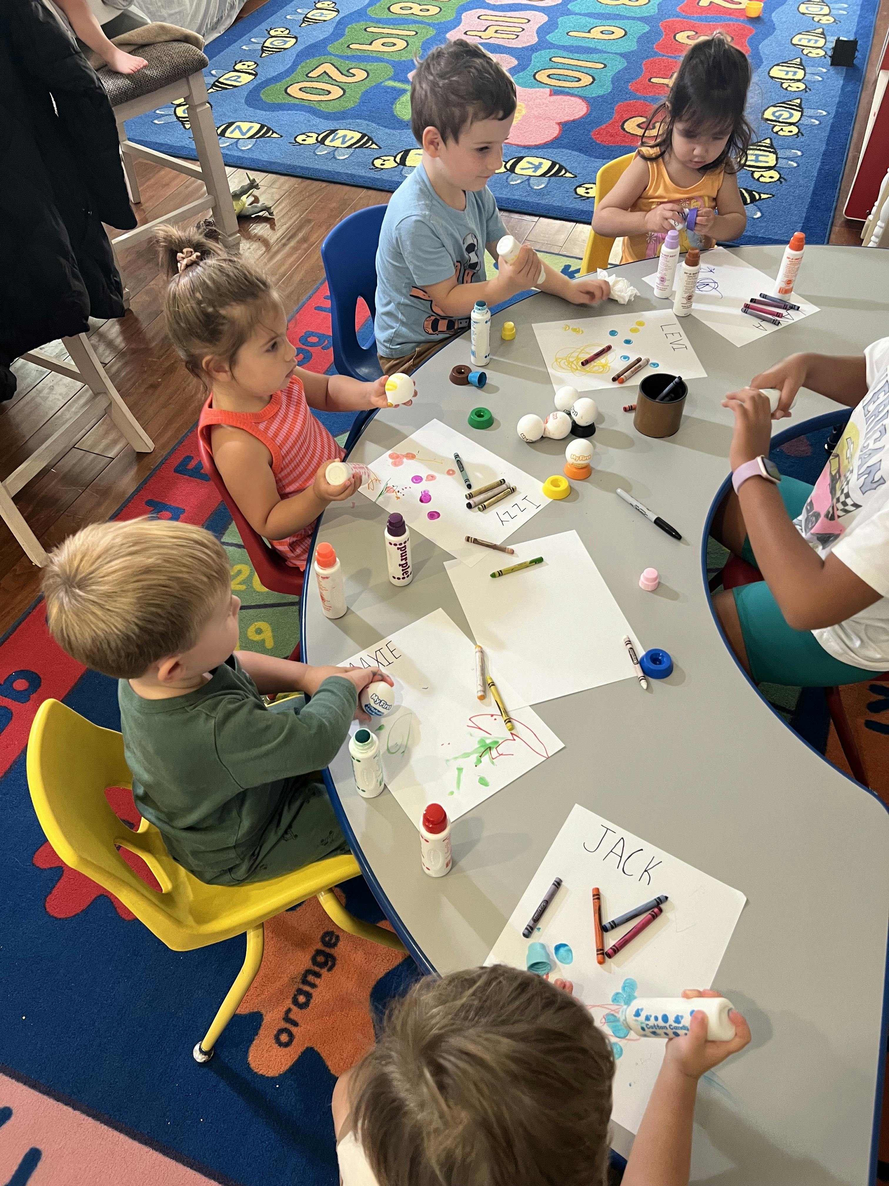 Children doing crafts at a table