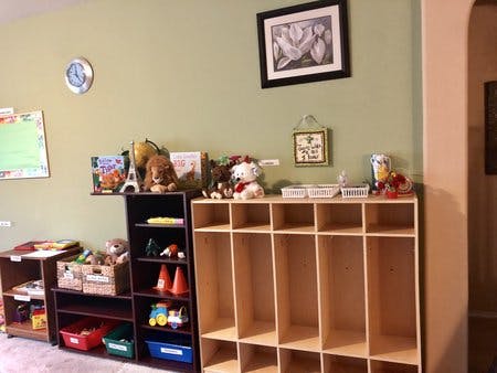 Classroom with shelves of toys and cubbies
