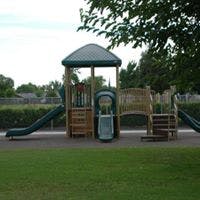 Playground structure with slides and climbing areas