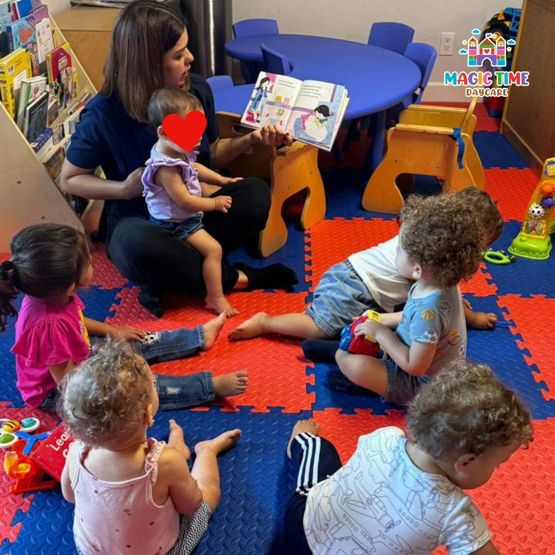 Person reading a book to several children in a classroom