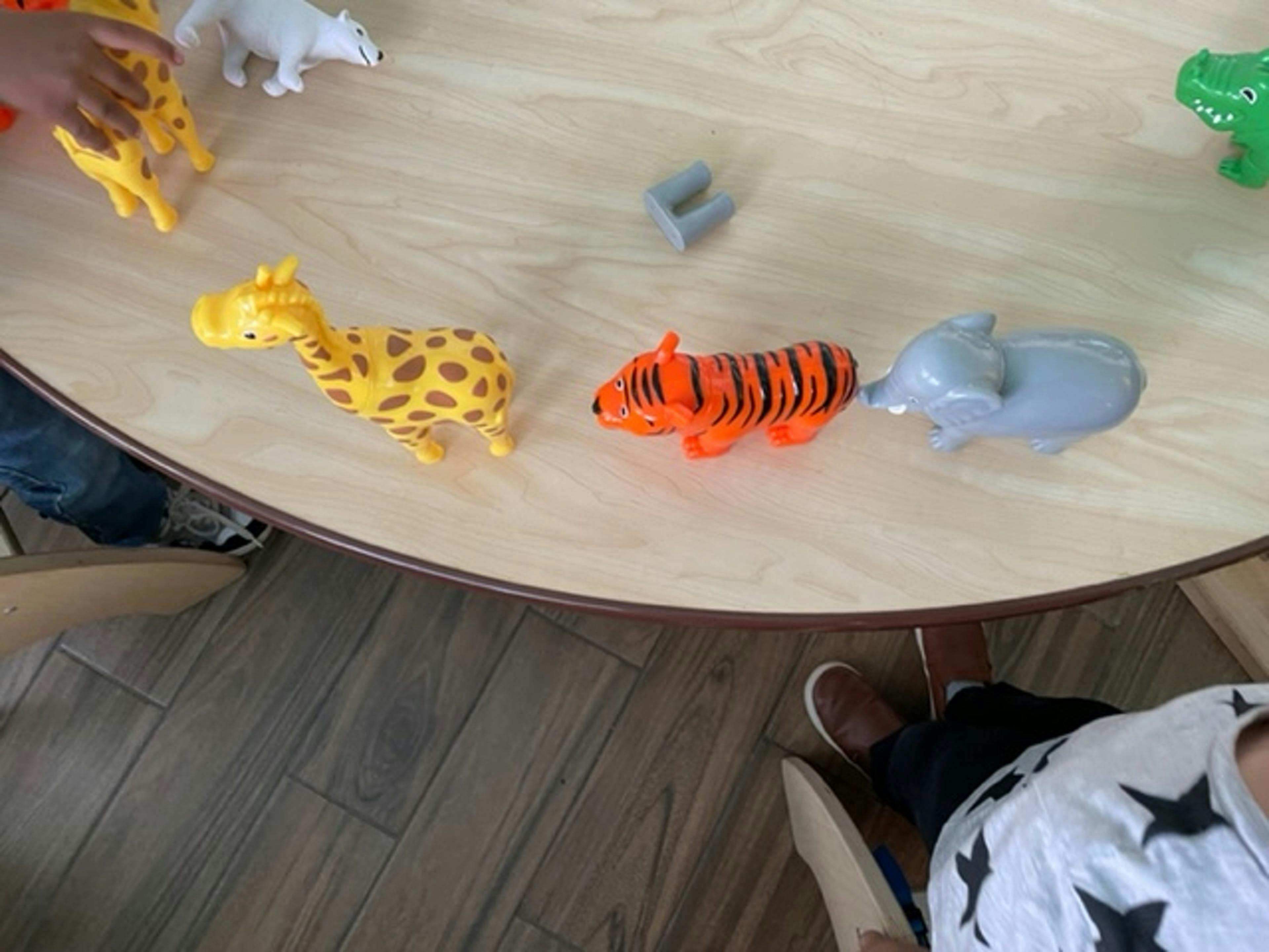 Plastic animal toys on a table