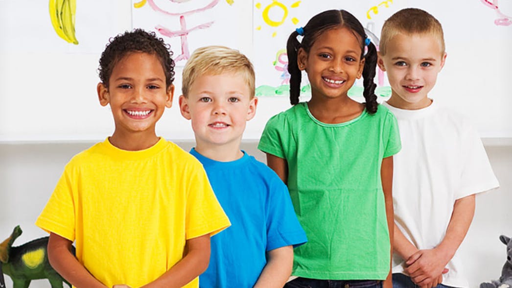 Four children standing together