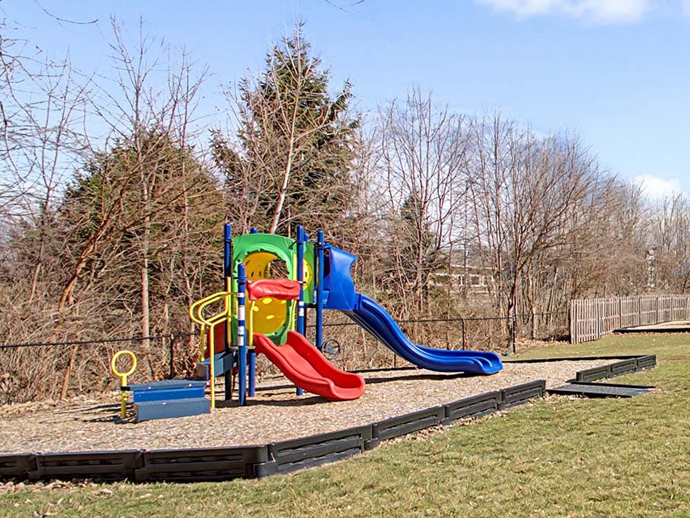 Colorful playground equipment with slides in a park