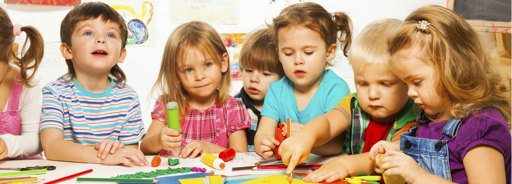 Children at a table engaged in an activity