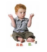 Child sitting with hands up and blocks on the floor