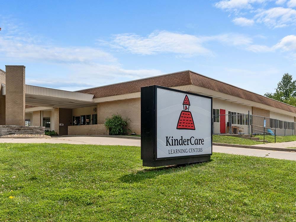 KinderCare Learning Centers sign in front of a building