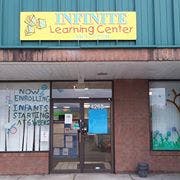 Infinite Learning Center sign above a building entrance