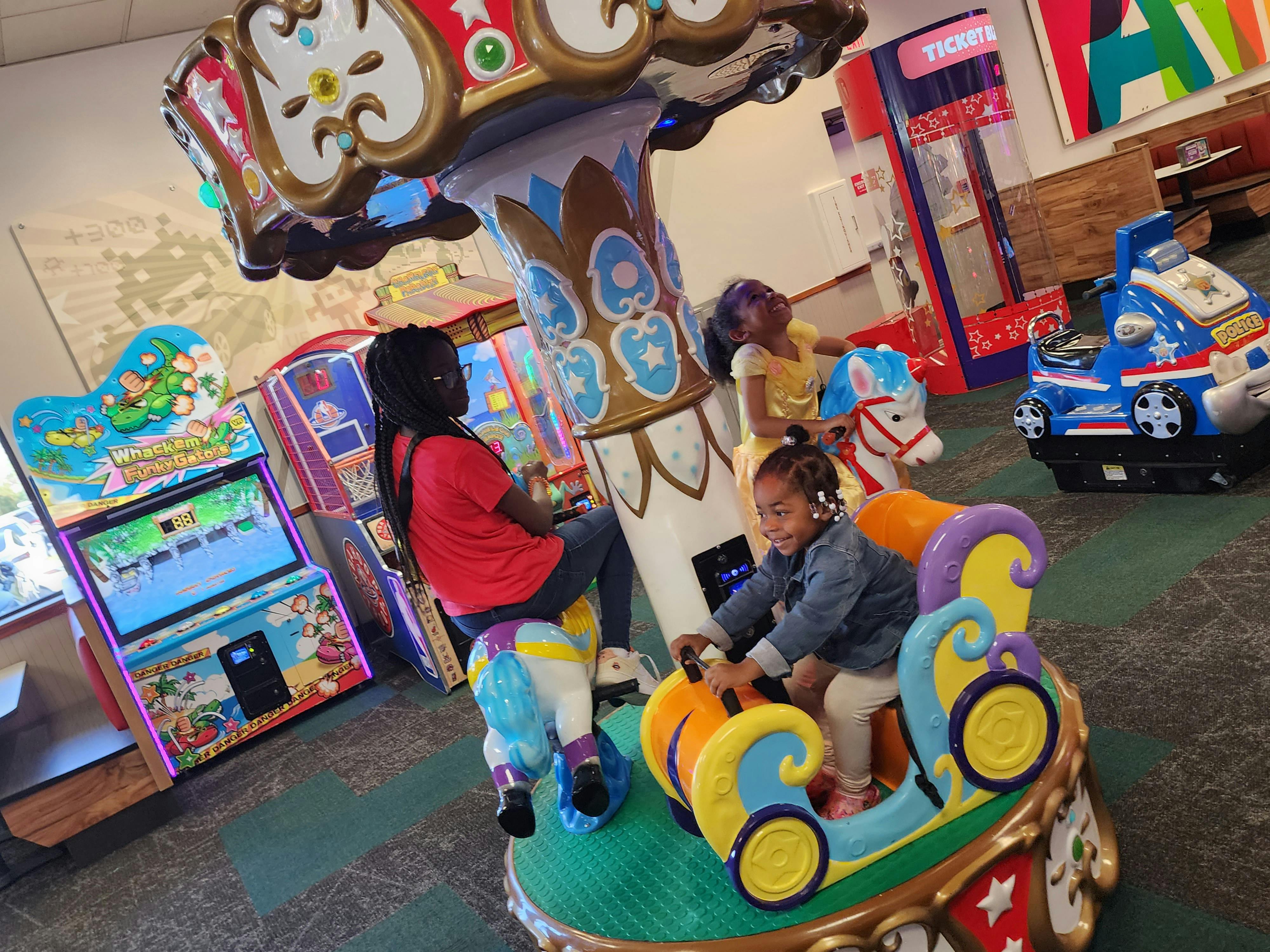 Children on a carousel ride