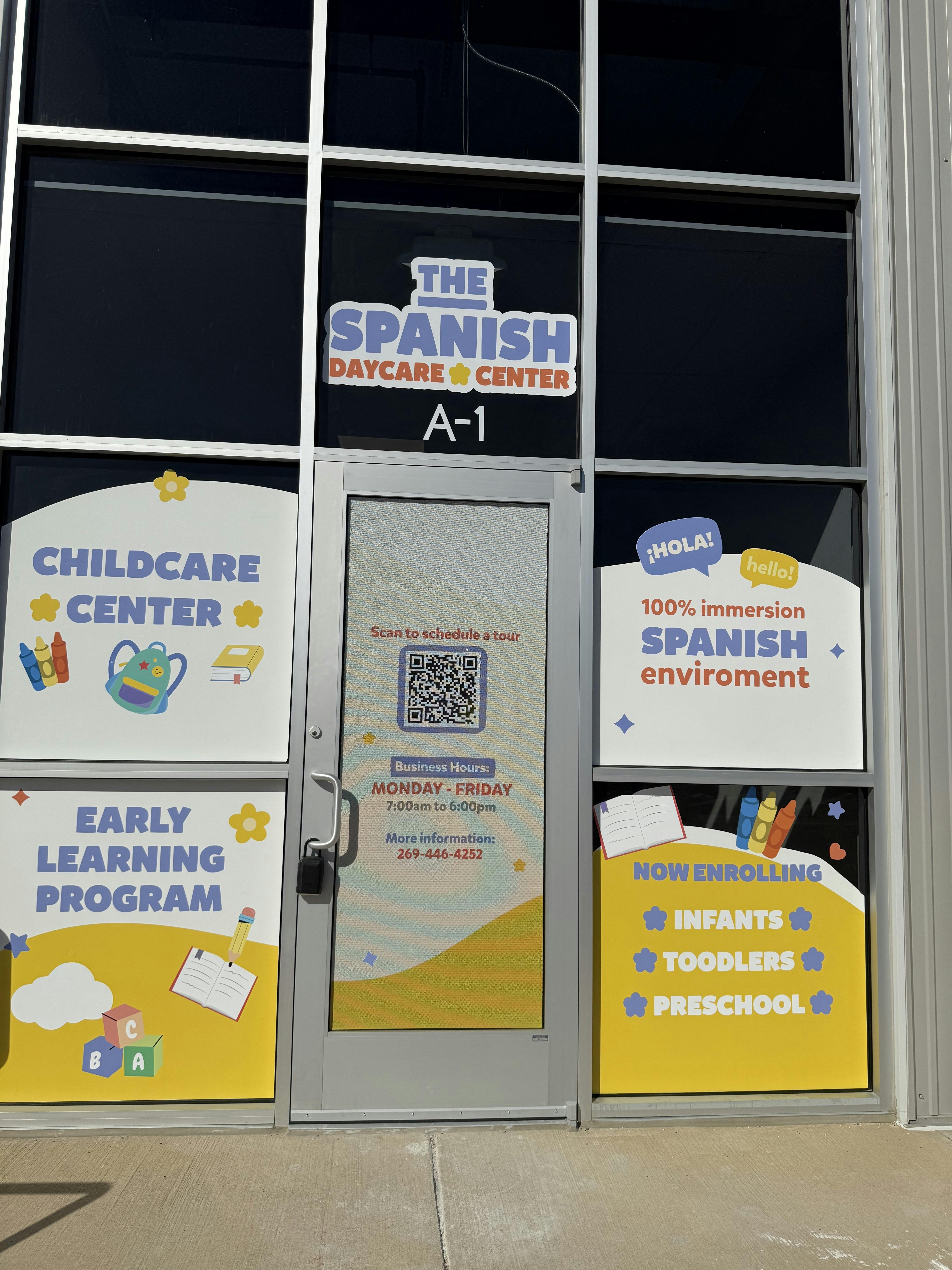 The Spanish Daycare Center sign with childcare information on windows