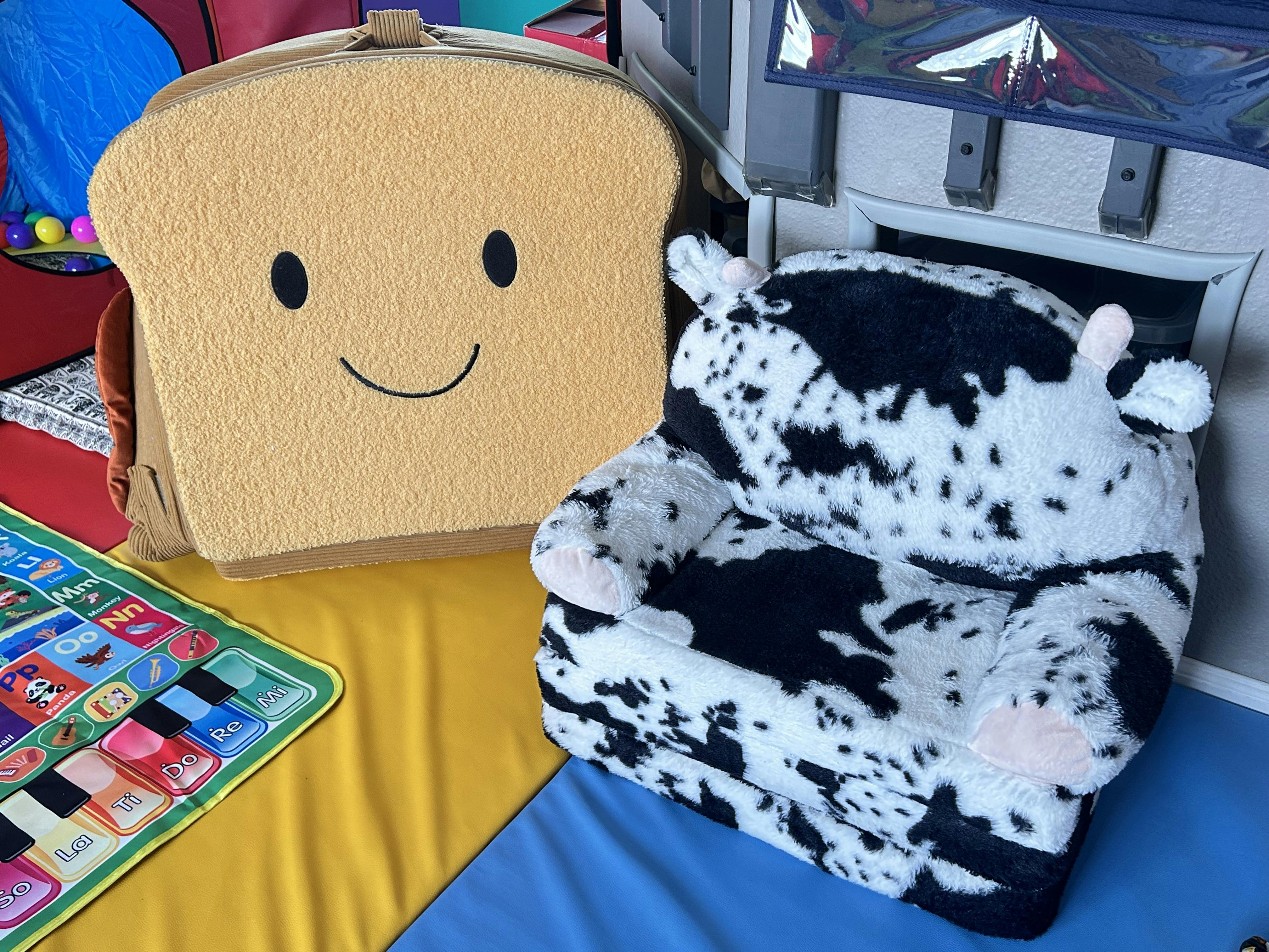 Plush toast shaped cushion and cow print toddler chair