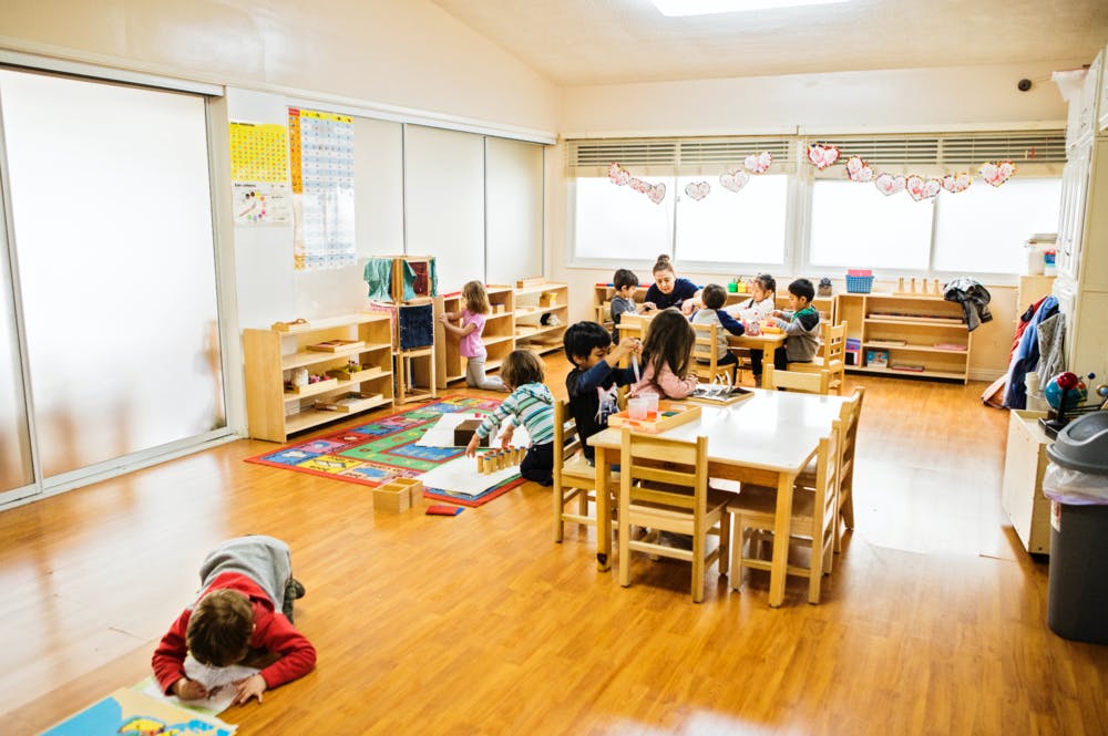 Children playing and learning in a classroom