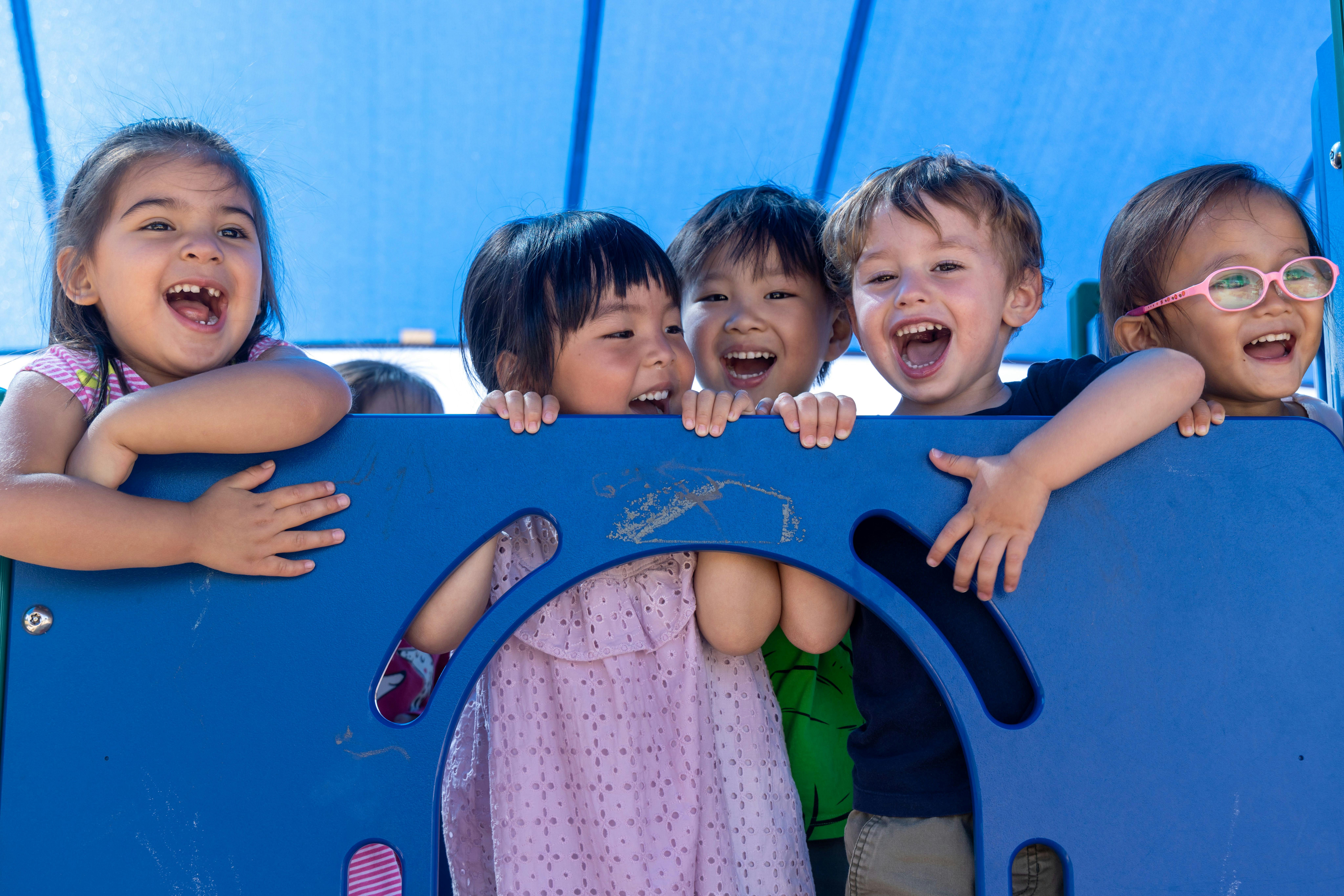 Group of children on a playground structure