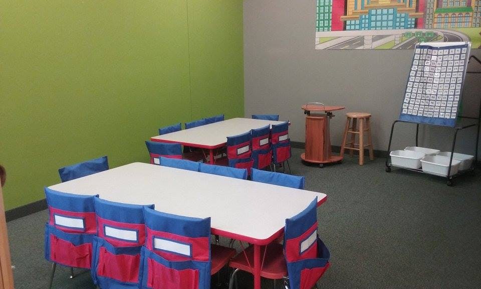 Classroom with small tables and chairs