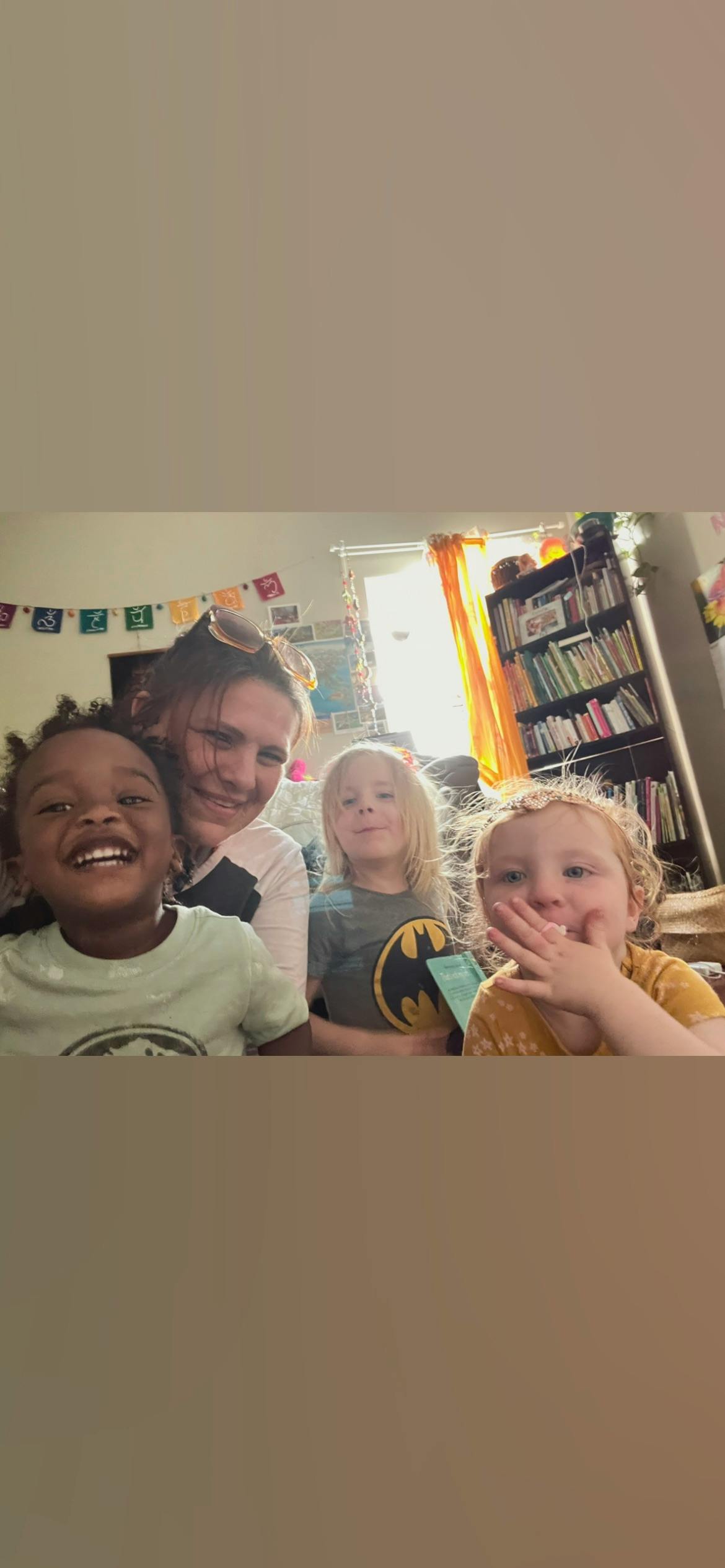 Person with three children